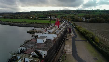 Crane-up-aerial-view-of-the-Fun-Ship-North-Wales,-formerly-the-TSS-Duke-of-Lancaster-Railway-Steamer
