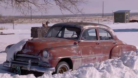 An-old-abandoned-Cadillac-in-Atomic-City,-Idaho-on-a-cold-winter-day