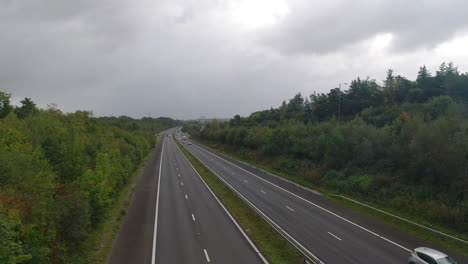 M4-Motorway-Freeway-Camera-Panning-Across-Multiple-Lanes-with-Moderate-Traffic-4K