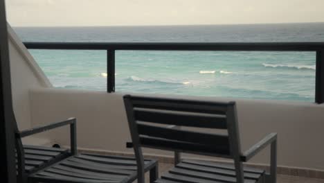 View-of-Caribbean-Sea-from-a-Hotel-Balcony-with-Chairs-and-Coffe-Table