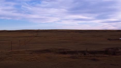 Prairie-land-in-the-morning-near-Alberta-Canada-filmed-from-over-head-with-a-drone