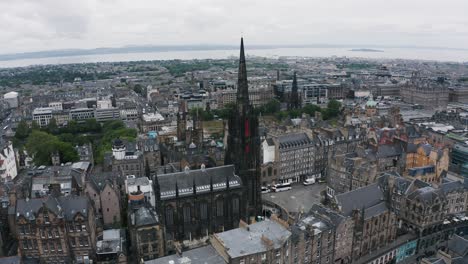Beautiful-aerial-of-The-Hub-and-historic-surroundings-in-Edinburgh