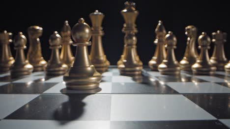 Sliding-cinematic-macro-shot-of-someone-moving-their-first-pawn-in-a-game-of-chess