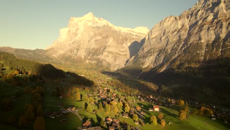 aerial-drone-footage-dolly-left-to-right-of-Grindelwald-village-and-Mount-Wetterhorn