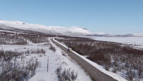 Awesome-drone-footage-that-follows-a-truck-in-Swedish-winter-conditions-in-northern-Sweden