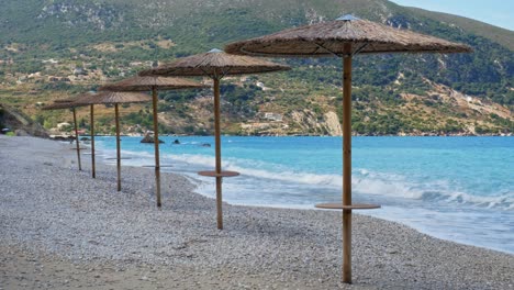 Waves-Crashing-In-Pebble-Beach-Of-Agia-Kyriaki-Beach-In-Kefalonia-Greece---wide-shot