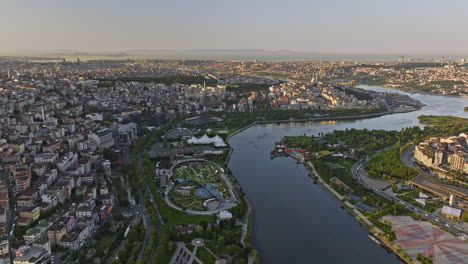 Istanbul-Turkey-Aerial-v33-panoramic-panning-view-capturing-golden-horn-urban-waterway-and-downtown-cityscape-across-eyüpsultan-and-beyoğlu-at-sunrise---Shot-with-Mavic-3-Cine---July-2022