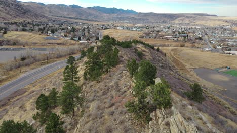 A-drone-pan-over-the-hogsback,-showing-trails-and-soccer-fields,-Golden-Colorado