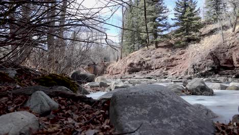 Frozen-river-Dolly-4K-in-Rockies
