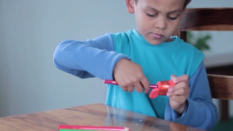 boy-with-pencil-sharpener-at-school-with-people-stock-video-stock-footage