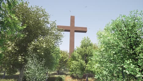 A-large-wooden-cross-standing-in-the-middle-of-a-forest,-with-trees,-bushes,-grass,-flowers-all-around-it,-and-seagulls-flying-above-it,-3D-animation-with-camera-dolly-up