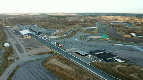 Formula-One-Cars-Racing-Down-The-Long-Racing-Track-Road-At-Circuit-Zandvoort-In-Netherlands