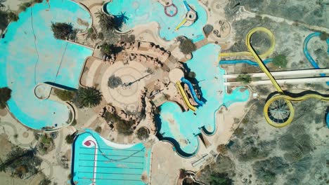 drone-shot-of-an-abandoned-water-park-in-the-desert