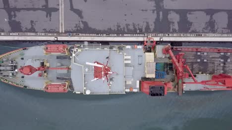 Drone-recording-from-above-of-deck-of-large-fishing-boat-from-stern-to-bow