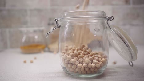 Pouring-Chick-Peas-into-a-Jar-video