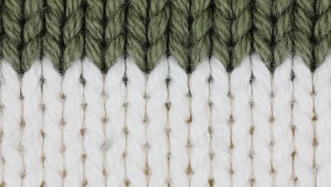 Weiß-Mit-Grüner-Strickwolle-Textur-Hintergrund---Nahaufnahme,-Schwenken