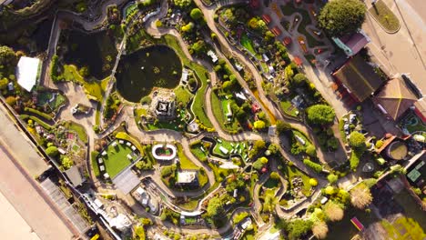 Merrivale-miniature-model-village-architectural-design-at-Great-Yarmouth,-Norfolk---Drone-descending-shot