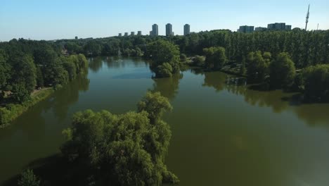 Aerial-View-of-a-Lake-in-a-City-Park
