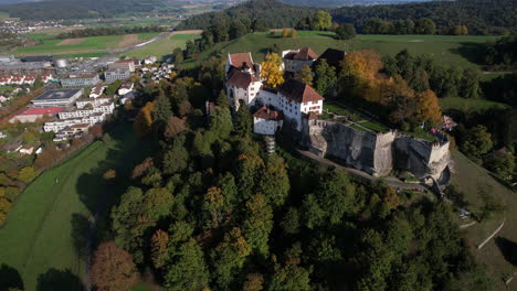 fantastic-aerial-shot-in-orbit-of-Lenzburg-castle,-located-in-the-canton-of-Aargau,-Switzerland