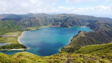 Reveal-Shot-of-Beautiful-Lagoa-do-Fogo-with-Panoramic-Blue-Water-View