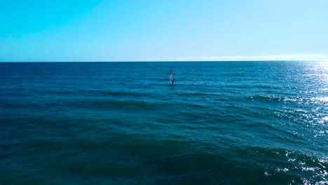 drone-view-of-windsurfer-in-the-ocean