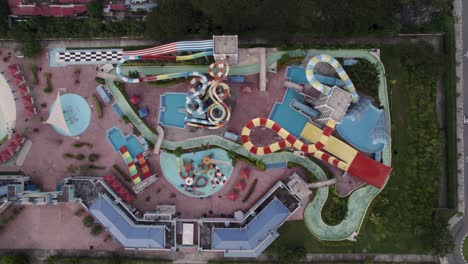 Top-down-view-of-a-colorful-waterpark-in-Kuha-city,-Malaysia