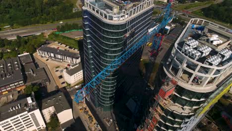 Aerial-Shot-of-Crane-on-Construction-Site
