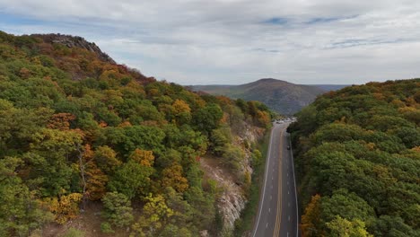 An-aerial-view-high-above-the-mountains-in-upstate-NY-during-the-fall-foliage-changes