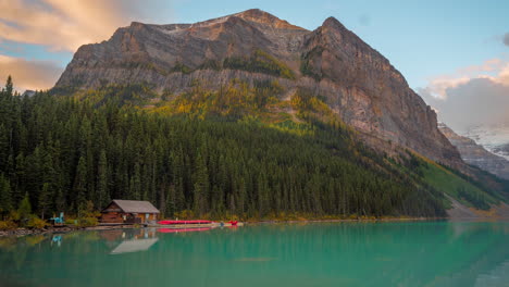 Time-Lapse-of-Lake-Louise,-Canada,-Clouds-Above-Water,-Hill,-Forest-and-Lodge-in-Banff-National-Park