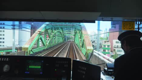 Driver-view-of-railway-train-track-in-Tokyo,-Japan