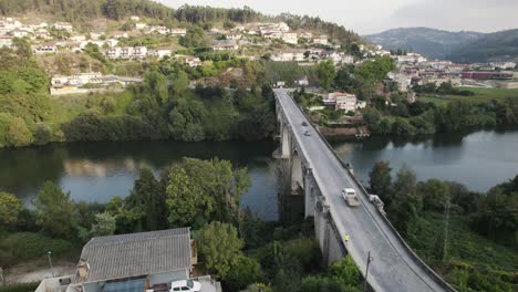 Car-traffic,-Ponte-Duarte-Pacheco-bridge-over-Douro-River,-Enter-os-Rios,-Portugal