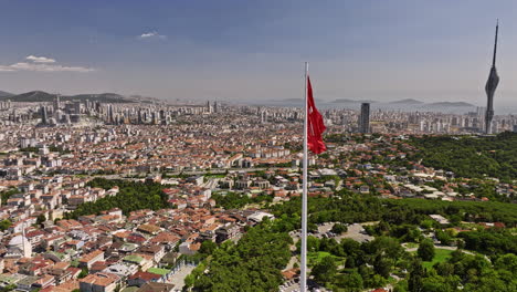 Istanbul-Turkey-Aerial-v79-fly-around-national-flag-on-top-of-camlica-hill-with-panoramic-view-of-downtown-cityscape-includes-telecommunication-tower-and-mosque---Shot-with-Mavic-3-Cine---July-2022