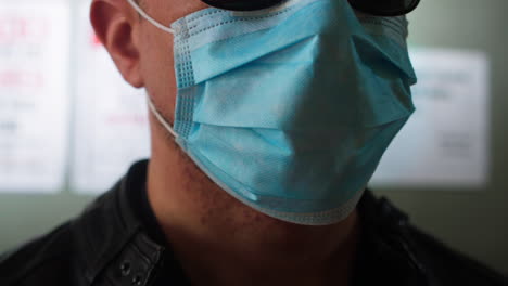 Man-wearing-a-covid-19-type-of-surgical-mask