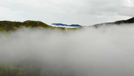 Low-Clouds-And-Fog-Over-Colorful-Rocky-Mountain-Alpine-Valley