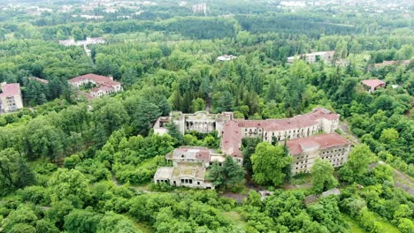 Abandoned-Soviet-era-sanatorium-building-complex-in-Georgia,-aerial-drone-view