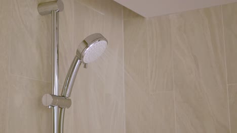 close-up-to-the-showerhead-in-shower-room