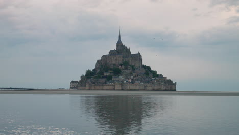 Rocky-Island-With-Mont-Saint-Michel-And-Monastery-In-Normandy,-France