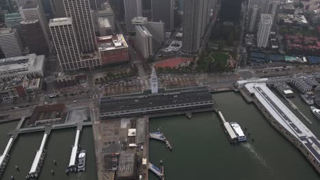 Aerial-view-of-the-San-Francisco-Ferry-Building,-in-USA---high-angle,-orbit,-drone-shot