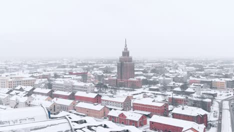 -Latvian-Academy-Of-Sciences-During-Snowing-Foggy-Weather,-Riga,-Eastern-Europe