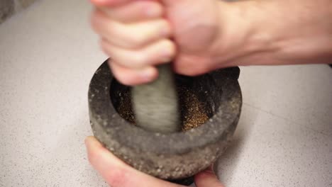 Using-a-Mortar-to-Grind-Black-Pepper