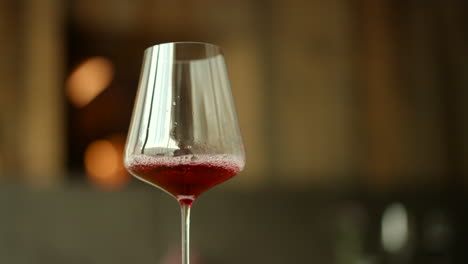 Red-wine-being-slowly-poured