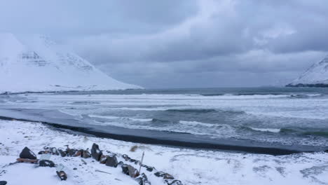Arctic-Ocean-Waves-Hit-The-Coast-At-Olafsfjordur-Town-In-North-Iceland