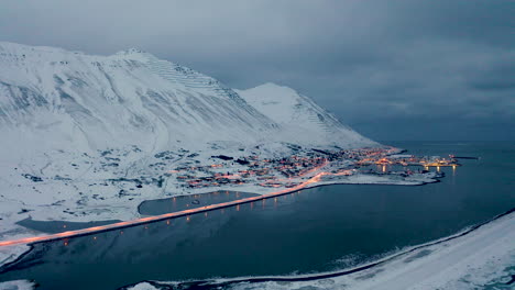 Breathtaking-Winter-Landscape-of-Siglufjörður-Town-in-North-Iceland---aerial-shot