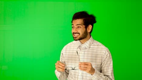 Indian-guy-express-emotion-with-green-background-green-screen