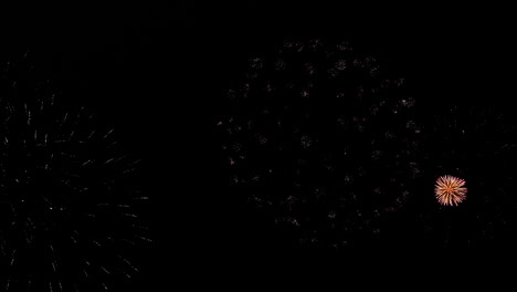 Ghost-Shell-Fireworks-Explosions-Effects-Against-Night-Back-Background