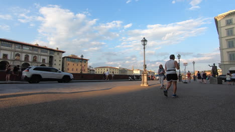 Clouds-and-pedestrians-Hyperlapse-from-a-busy-street-on-the-Arno-river