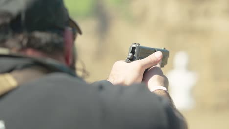Pistol-being-shot-in-240fps-at-shooting-range