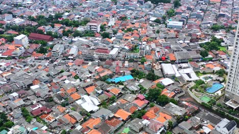 dense-asian-residential-neighborhood-in-west-Jakarta-Indonesia,-aerial