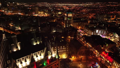Panoramic-View-On-Old-Quebec-Illuminated-At-Night-In-Quebec-City,-Canada---aerial-drone-shot