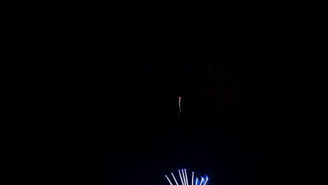 Colorful-Firework-display-at-night-on-sky-background